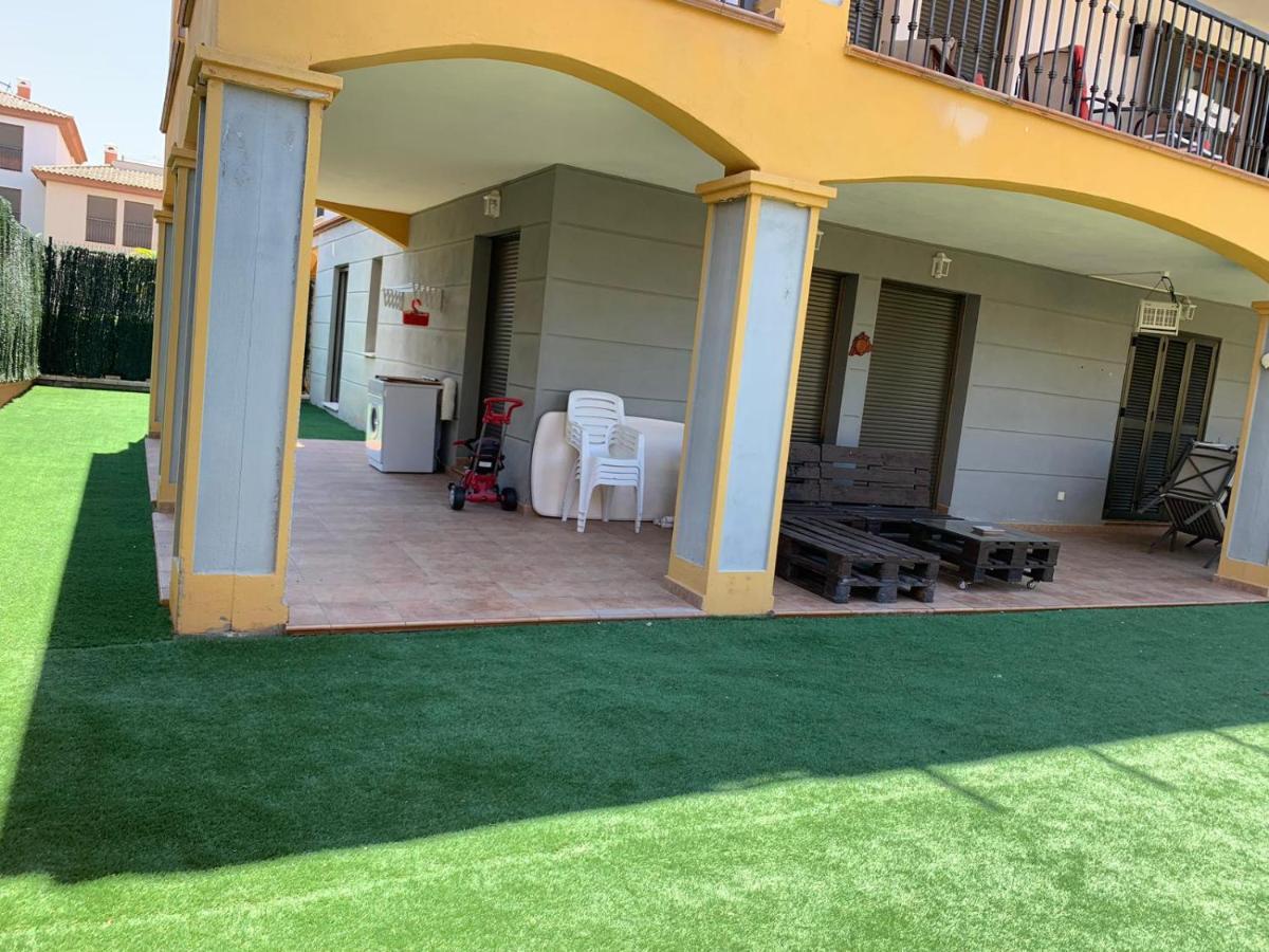 Apartamento con jardín privado y acceso a piscina Apartamento Huelva Exterior foto